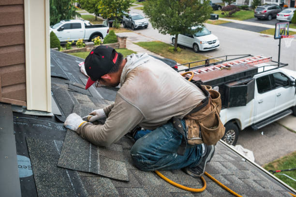 Professional Flat Roof Repair technician working in Charlton City, MA